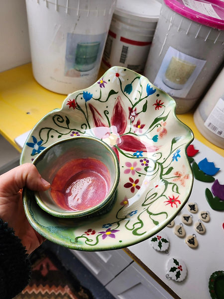 Hand-painted ceramic bowl and decorative plate set