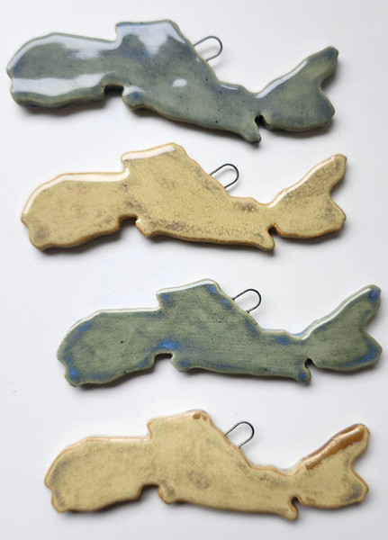 Nova Scotia shaped ceramic ornaments with coastal designs